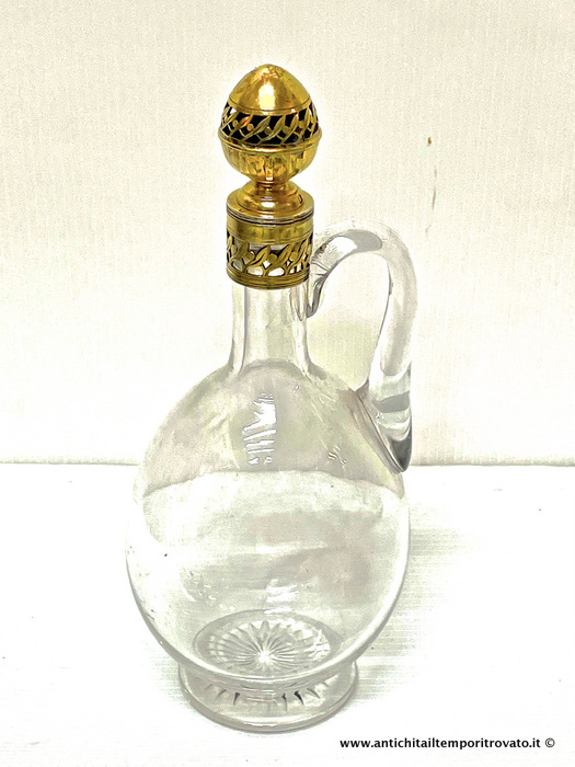 Antica bottiglia in cristallo e argento punzonato Minerva - Antica  bottiglia in cristallo dine 800 con argento vermeil inciso e traforato