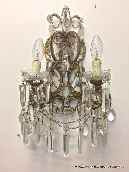 Antica coppia di appliques in cristallo a due luci - Antica coppia appliques in ferro battuto e cristalli