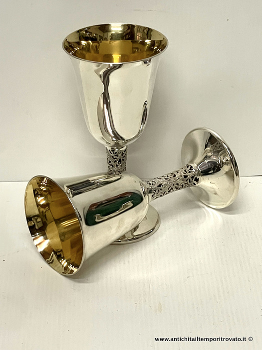 Tête-à-tête calici flûte in argento 800 con stelo traforato, argentiere Stancampiano - Coppia di calici flûte in argento 800 con interno in vermeille