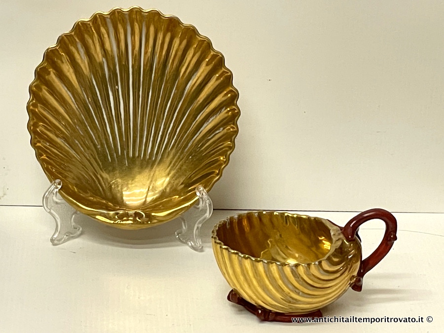 Oggettistica d'epoca → Tazze da collezione → Antica  tazza con piattino a forma di conchiglia Pierre Louis Dagoty

Importante e antica tazza con piattino abbinato Primo Impero (1804/1814): clicca qui. Sia la tazza che il piattino abbinato, hanno la forma di una conchiglia: bianco e oro con manico rosso a forma di …

... continua ...

