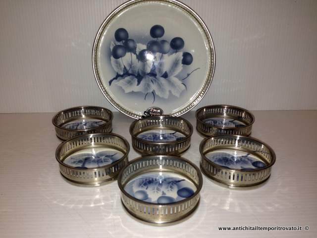 Oggettistica d'epoca → Porcellane e ceramiche → Antico set portabottiglia e portabicchieri Antico set in metallo argentato e ceramica
Antico set inglese composto da un portabottiglia (Ø15; h.2,5) e sei portabicchieri (Ø7; h.2) con ringhierina in metallo argentato e fondo in ceramica. Il set del periodo dèco …
... continua ...
Immagine:immagini/catalogo/4000/4109.jpg