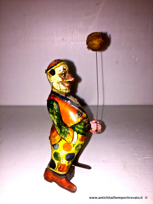 Antico giocattolo tedesco in latta: pagliaccio con palloncino - Antico pagliaccio con palloncino carica a chiavetta