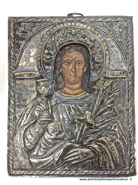 Oggettistica d'epoca → Arte sacra → Antica icona di Santa Barbara dipinta a mano con riza in argento Icona di Santa Barbara del 1880 con oklad in argento sbalzato
Antica e interessante icona russa realizzata nel 1880 (punzone data e titolo argento foto n°9) raffigurante Santa Barbara che con una mano tiene un calice e con l'altra una palma con la croce: …
... continua ...
Immagine:immagini/catalogo/6000/6691.jpg